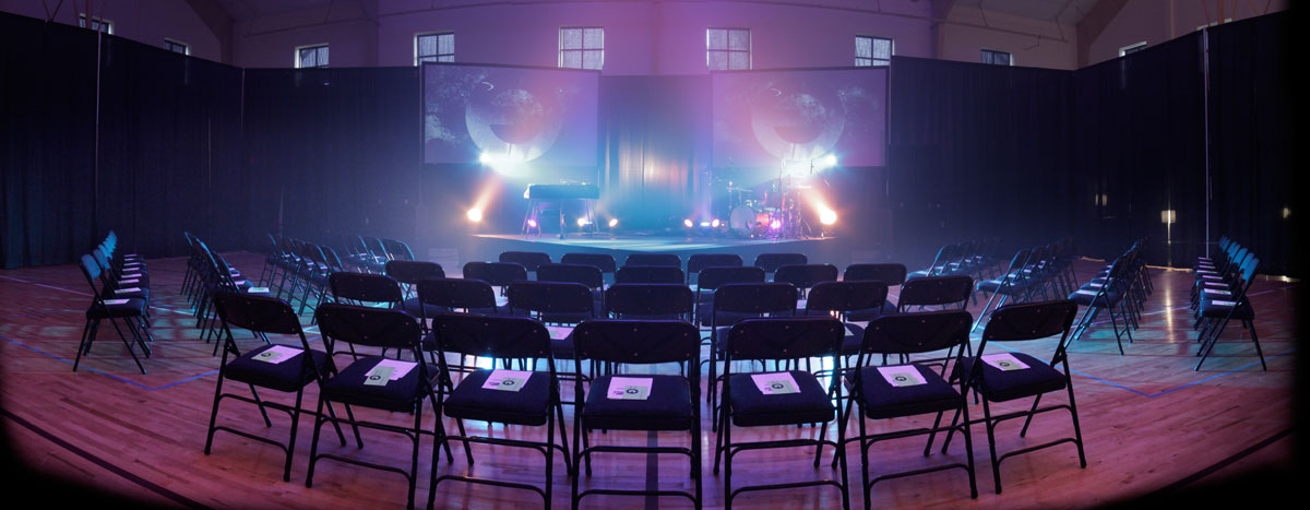 A typical portable church setup in a school gymnasium