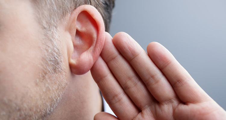 54427788 - man with hand on ear listening for quiet sound or paying attention