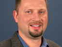 QSC Promotes TJ Adams to Vice President, Systems Product Strategy and Development
