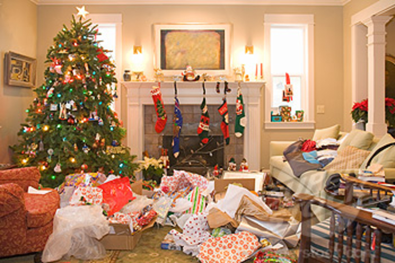 christmas tree with wrapping paper mess