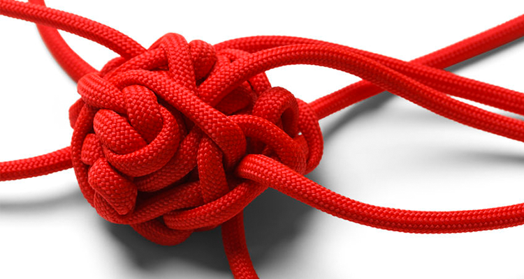 red rope tangled knot gordian